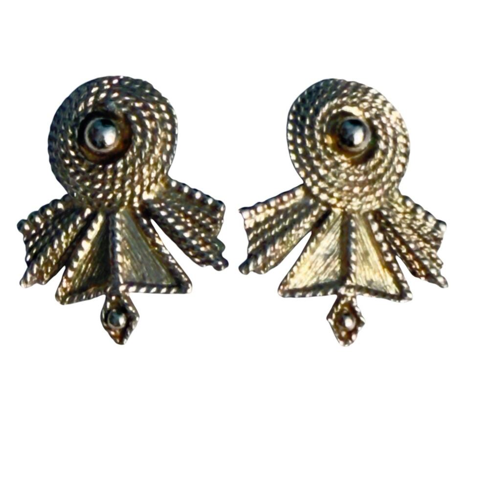 vintage clip on silver statement earrings celebrity fan shape stylized sunburst